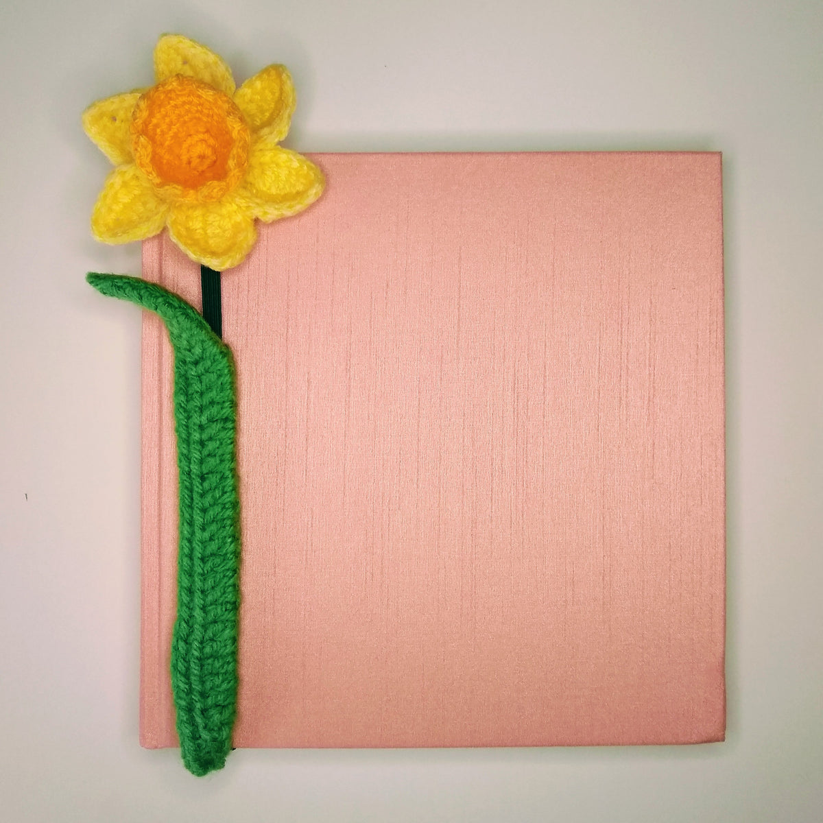 Handmade elasticated daffodil bookmark.